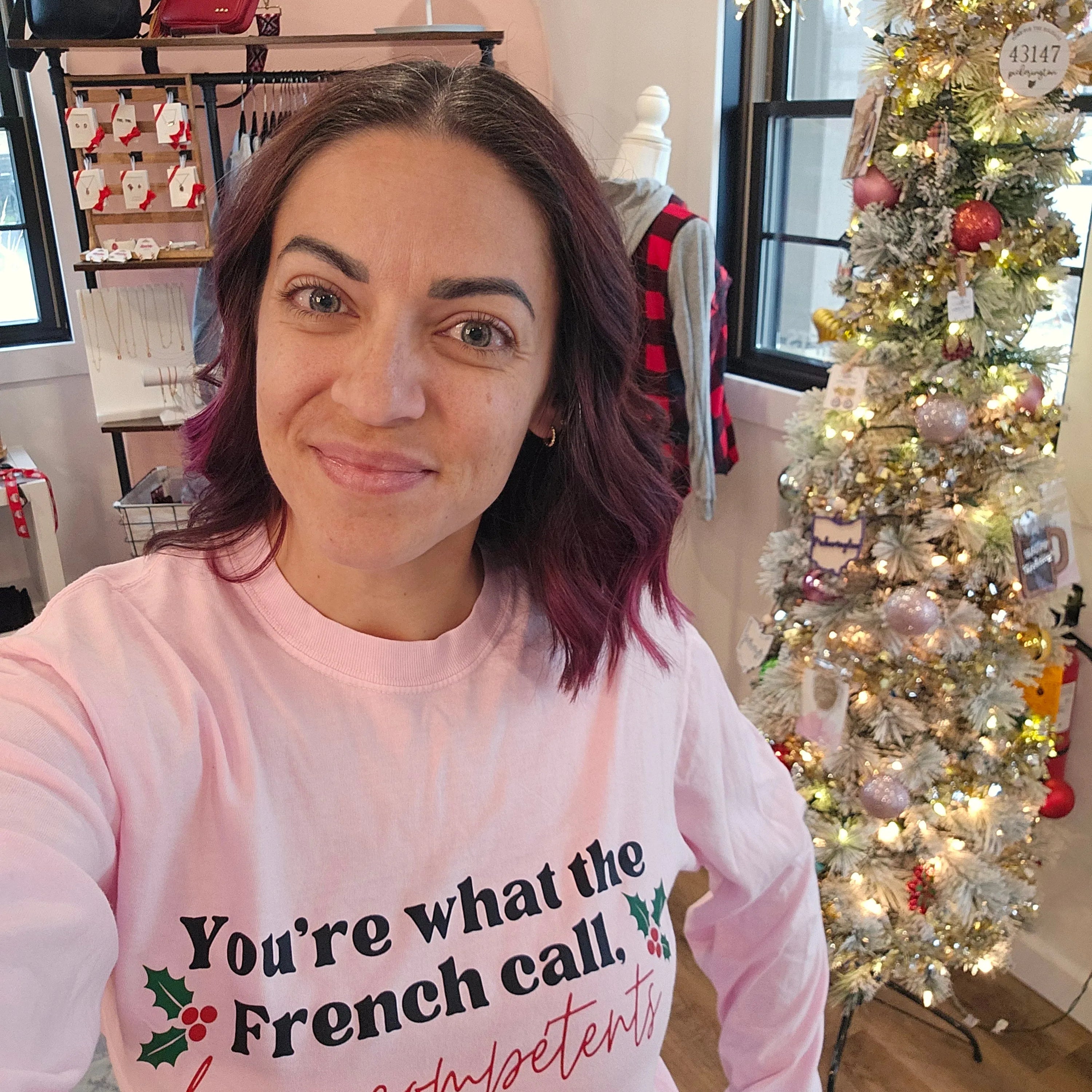 Shop You're What The French Call Les Incompétents Graphic Top | Home Alone Christmas- at Ruby Joy Boutique, a Women's Clothing Store in Pickerington, Ohio
