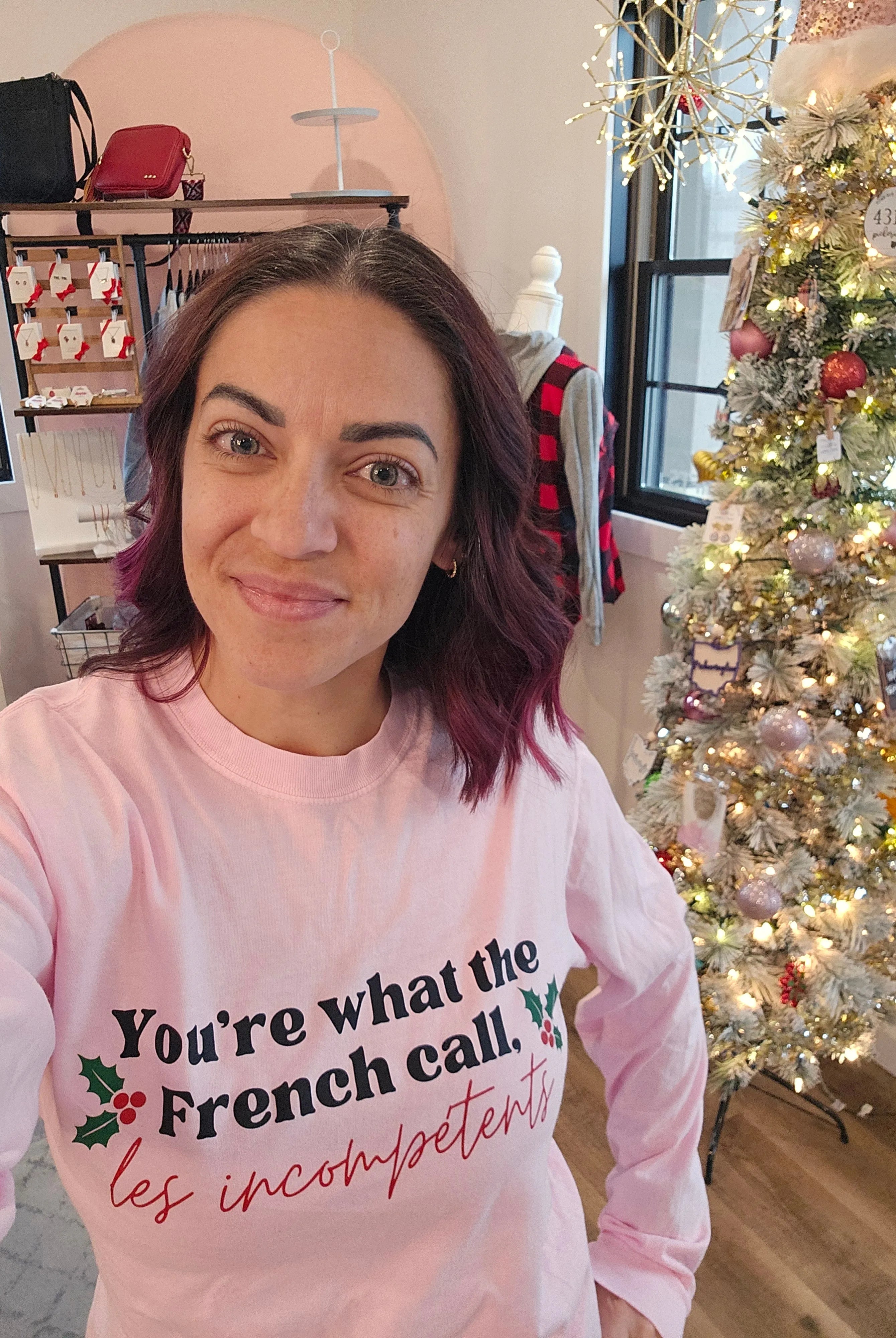 Shop You're What The French Call Les Incompétents Graphic Top | Home Alone Christmas- at Ruby Joy Boutique, a Women's Clothing Store in Pickerington, Ohio