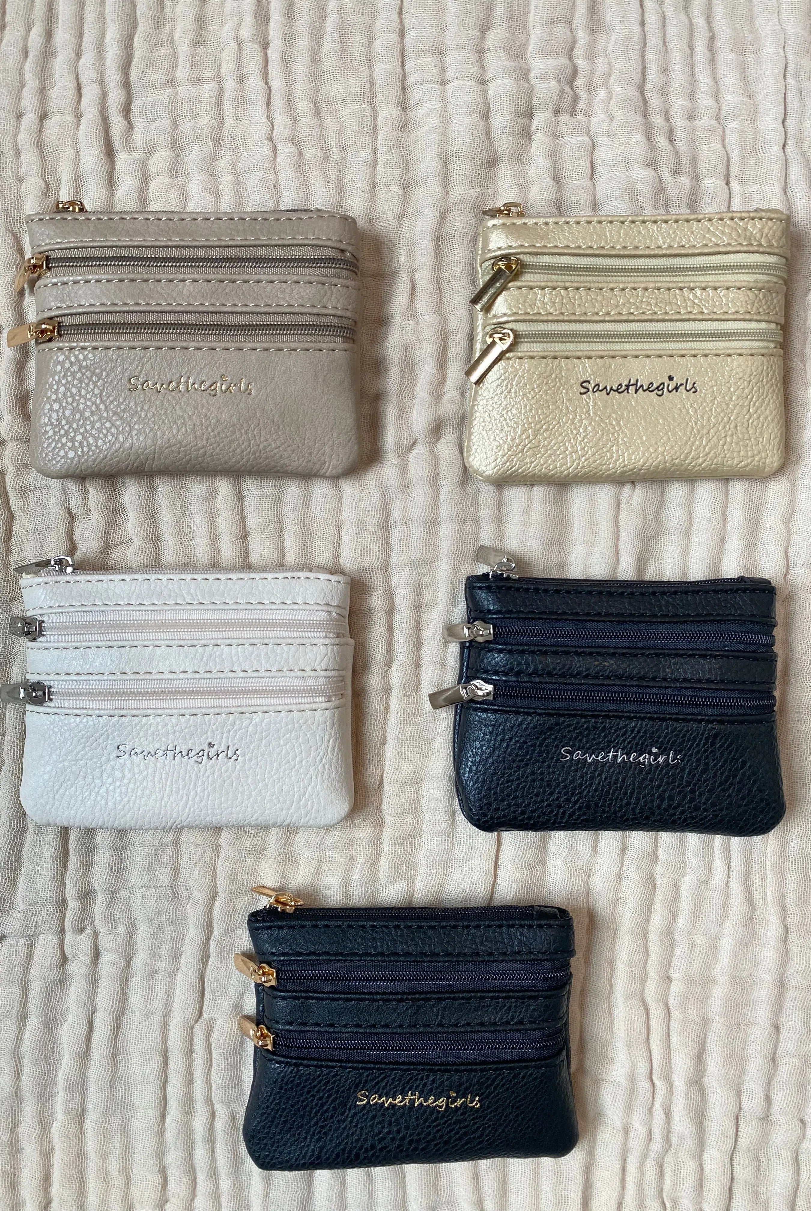 Shop Zippered Pouch | Save The Girls-Coin Purse at Ruby Joy Boutique, a Women's Clothing Store in Pickerington, Ohio