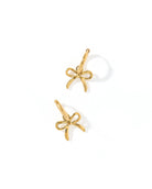 Shop Sadie Bow Huggie Charm Earrings - Gold- at Ruby Joy Boutique, a Women's Clothing Store in Pickerington, Ohio