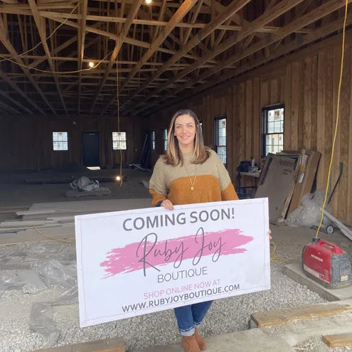 Danielle Resseguie shows off the space at 88 W. Church St., Suite 100 where her women's and children's clothing shop, Ruby Joy Boutique, is expected to open in March.