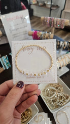 Shop 14K Gold-Filled Mantra Bracelet - White with Gold Letters-Bracelets at Ruby Joy Boutique, a Women's Clothing Store in Pickerington, Ohio