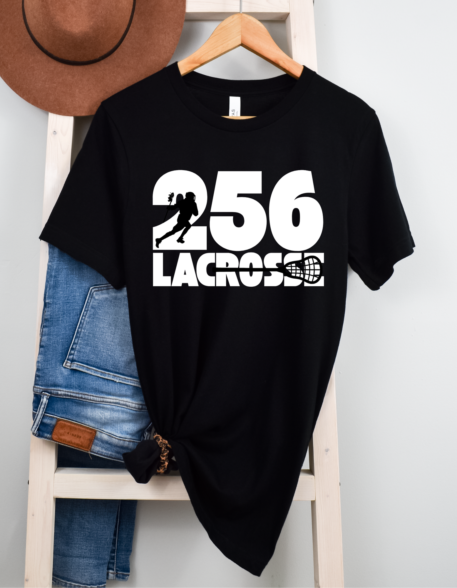 Shop 256 Cutout Silhouettes Graphic Tee-Small at Ruby Joy Boutique, a Women's Clothing Store in Pickerington, Ohio