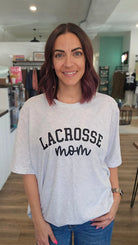 Shop 256 Lacrosse Custom Text Graphic Tee-Tee at Ruby Joy Boutique, a Women's Clothing Store in Pickerington, Ohio