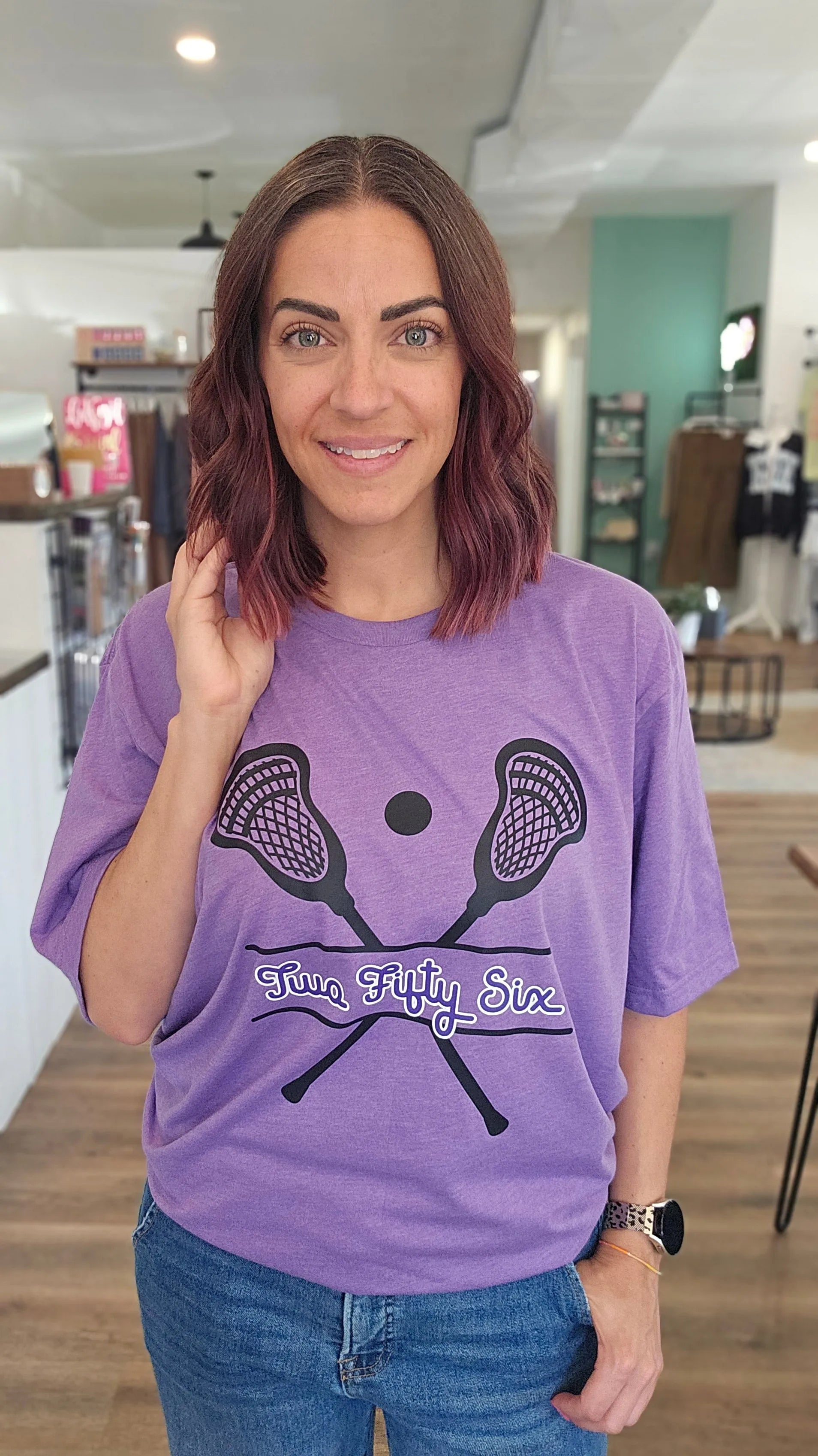 Shop 256 Lacrosse Sticks Graphic Tee- at Ruby Joy Boutique, a Women's Clothing Store in Pickerington, Ohio