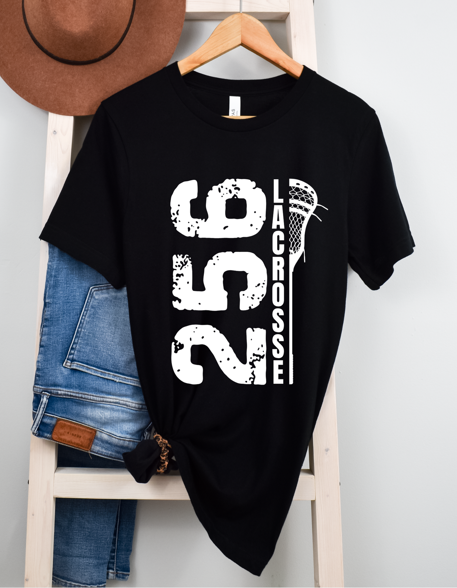 Shop 256 Vertical Lacrosse Stick Graphic Tee-Small at Ruby Joy Boutique, a Women's Clothing Store in Pickerington, Ohio