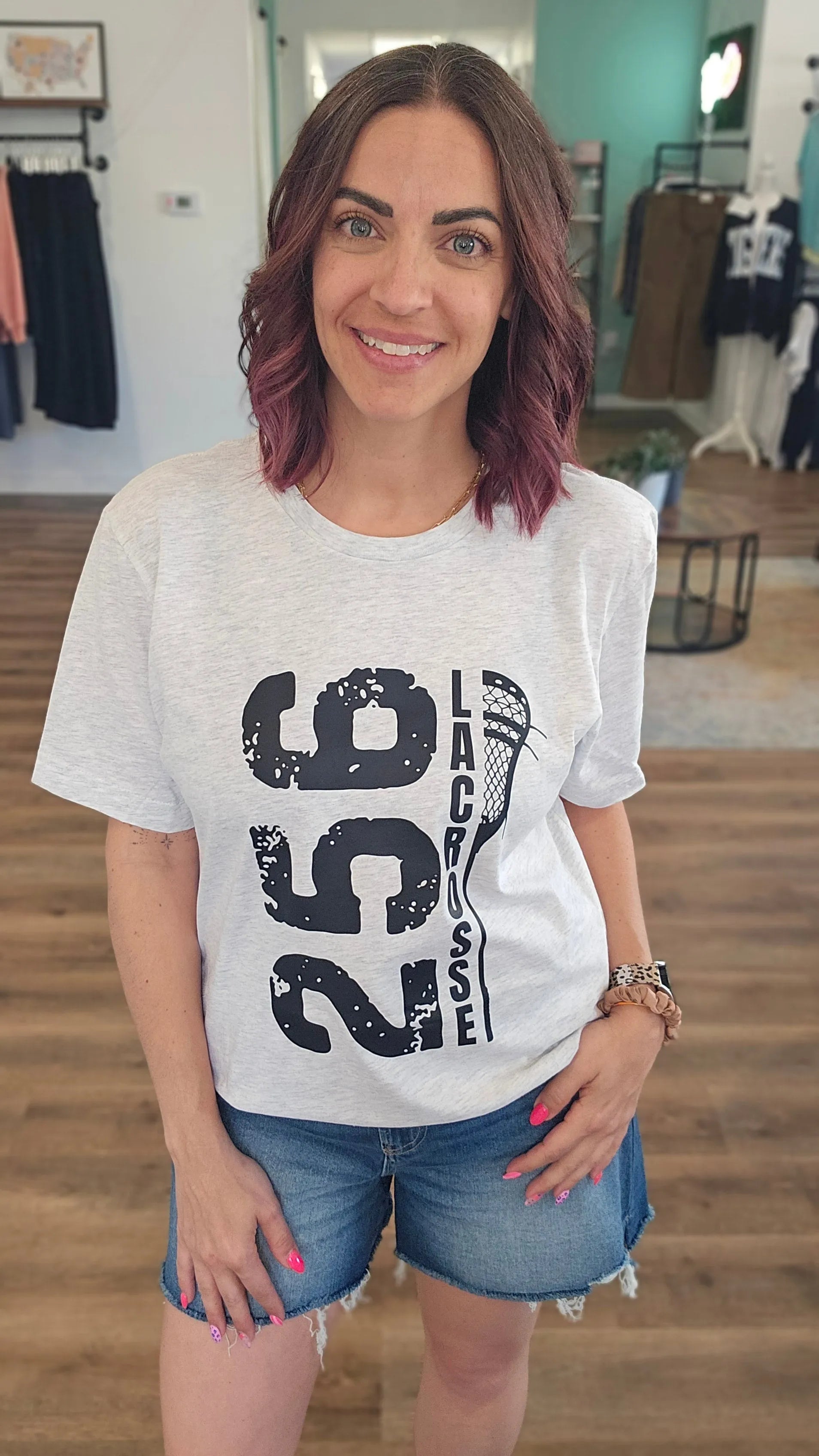 Shop 256 Vertical Lacrosse Stick Graphic Tee- at Ruby Joy Boutique, a Women's Clothing Store in Pickerington, Ohio