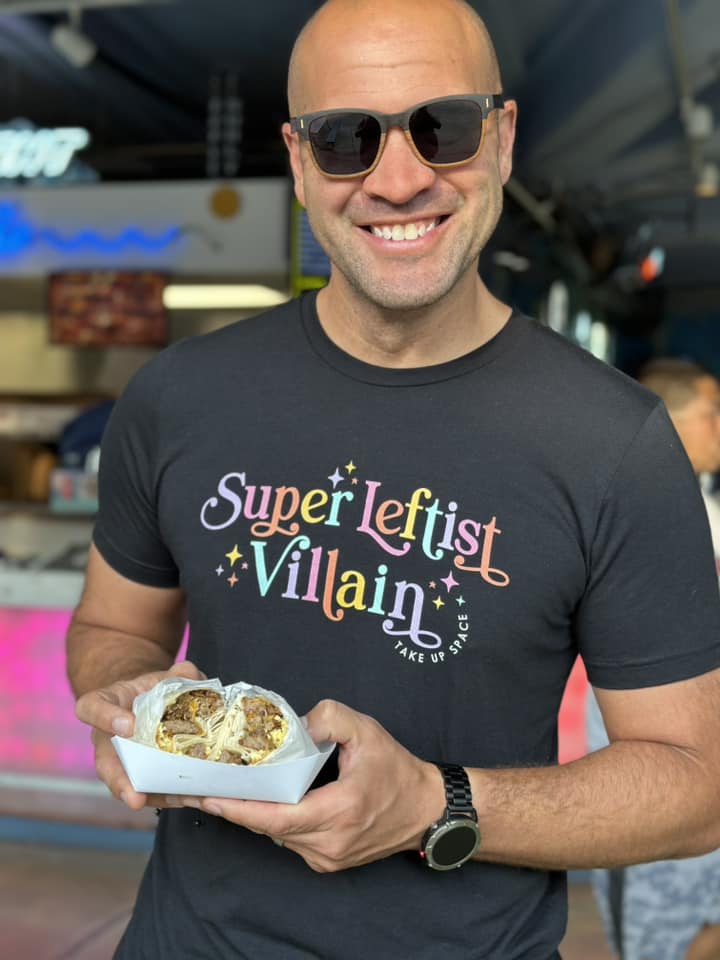 Shop Super Leftist Villain Classic Tee- at Ruby Joy Boutique, a Women's Clothing Store in Pickerington, Ohio