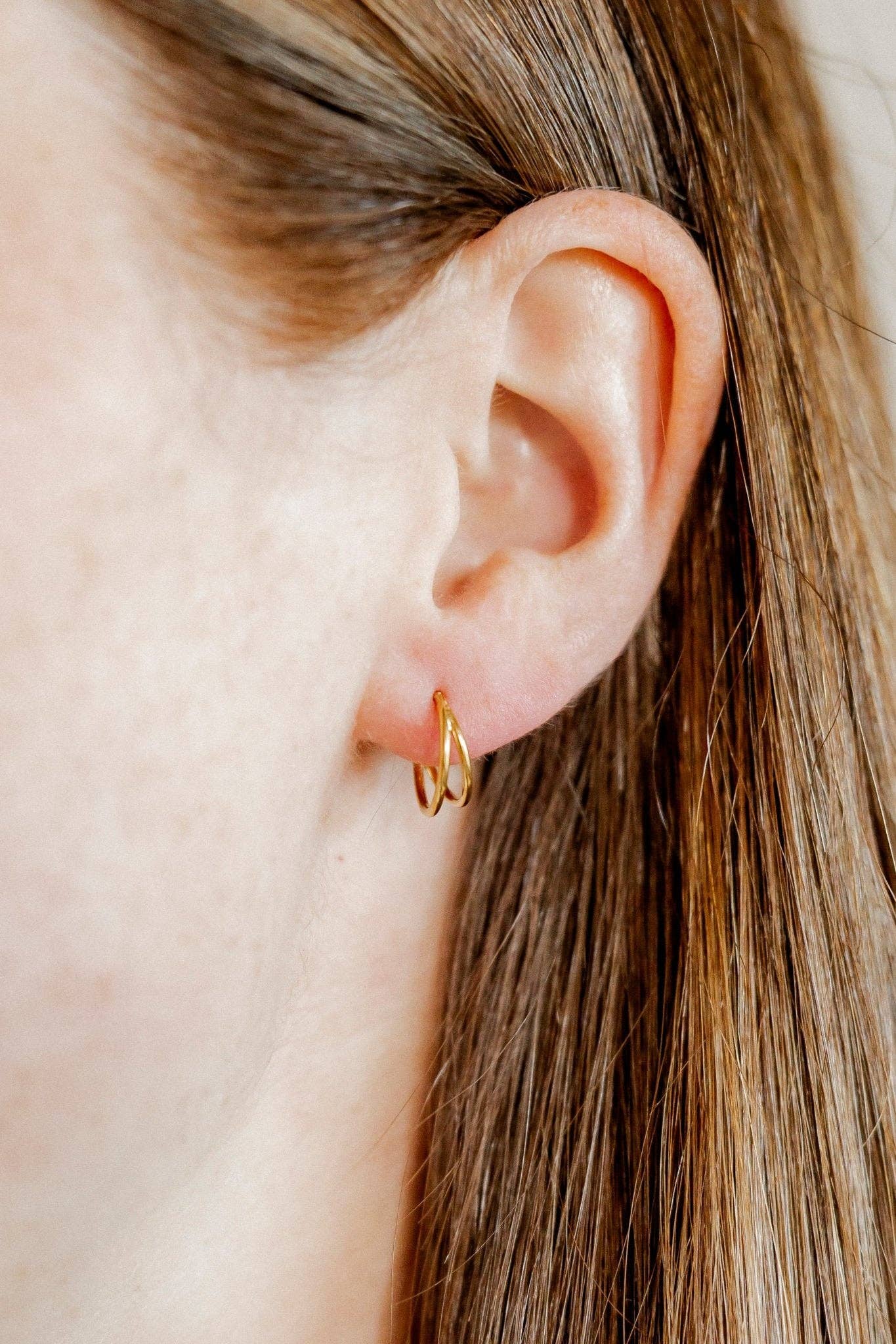 Shop Nylah Huggie Earrings - 10mm Gold- at Ruby Joy Boutique, a Women's Clothing Store in Pickerington, Ohio