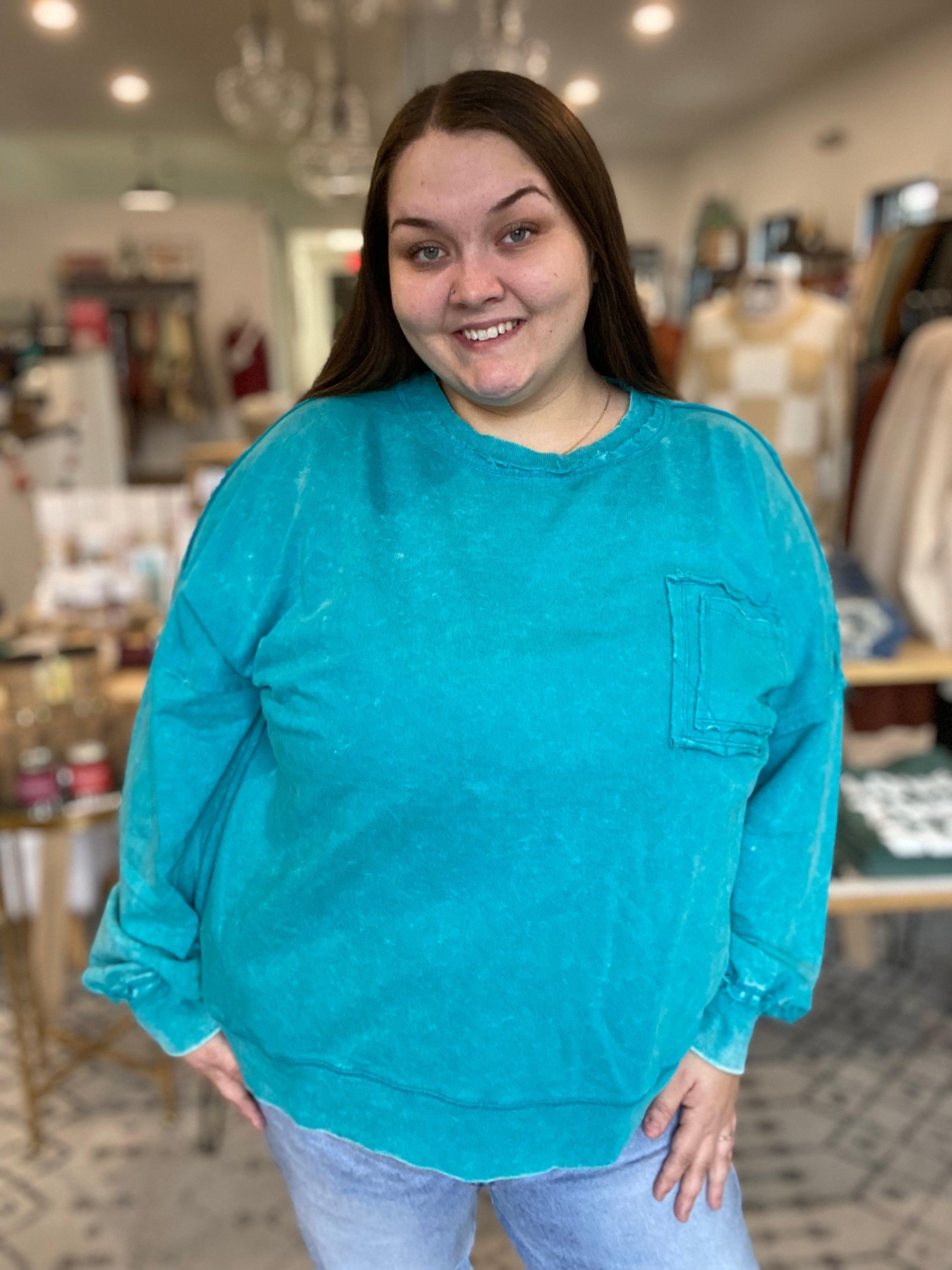 Shop Acid Wash Raw Edge Pullover with Pockets - Turquoise-sweatshirt at Ruby Joy Boutique, a Women's Clothing Store in Pickerington, Ohio