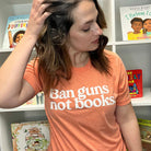 Shop Ban Guns Not Books Classic Tee | Kind Cotton- at Ruby Joy Boutique, a Women's Clothing Store in Pickerington, Ohio