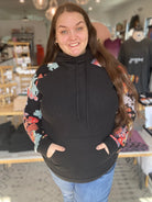 Shop Black and Floral Sleeve Hoodie-Hoodie at Ruby Joy Boutique, a Women's Clothing Store in Pickerington, Ohio