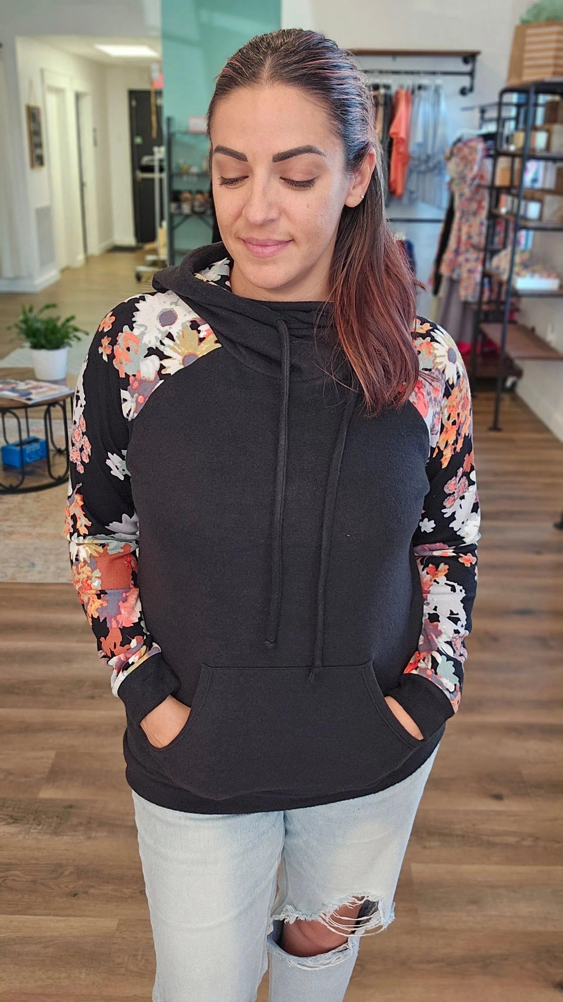 Shop Black and Floral Sleeve Hoodie-Hoodie at Ruby Joy Boutique, a Women's Clothing Store in Pickerington, Ohio