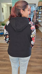 Shop Black and Floral Sleeve Hoodie-Hoodie at Ruby Joy Boutique, a Women's Clothing Store in Pickerington, Ohio