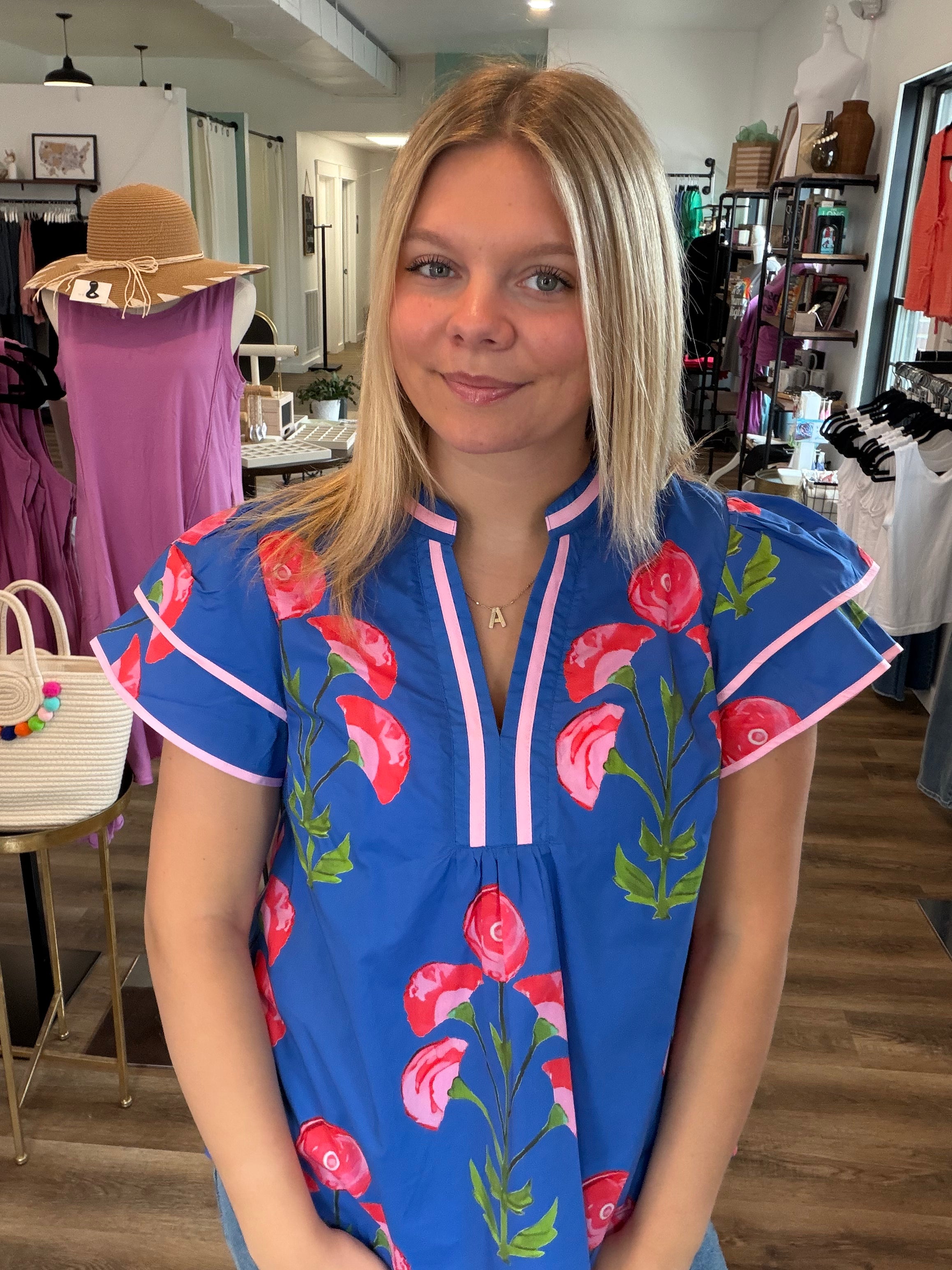 Shop Blossom Meadow Print Top- at Ruby Joy Boutique, a Women's Clothing Store in Pickerington, Ohio