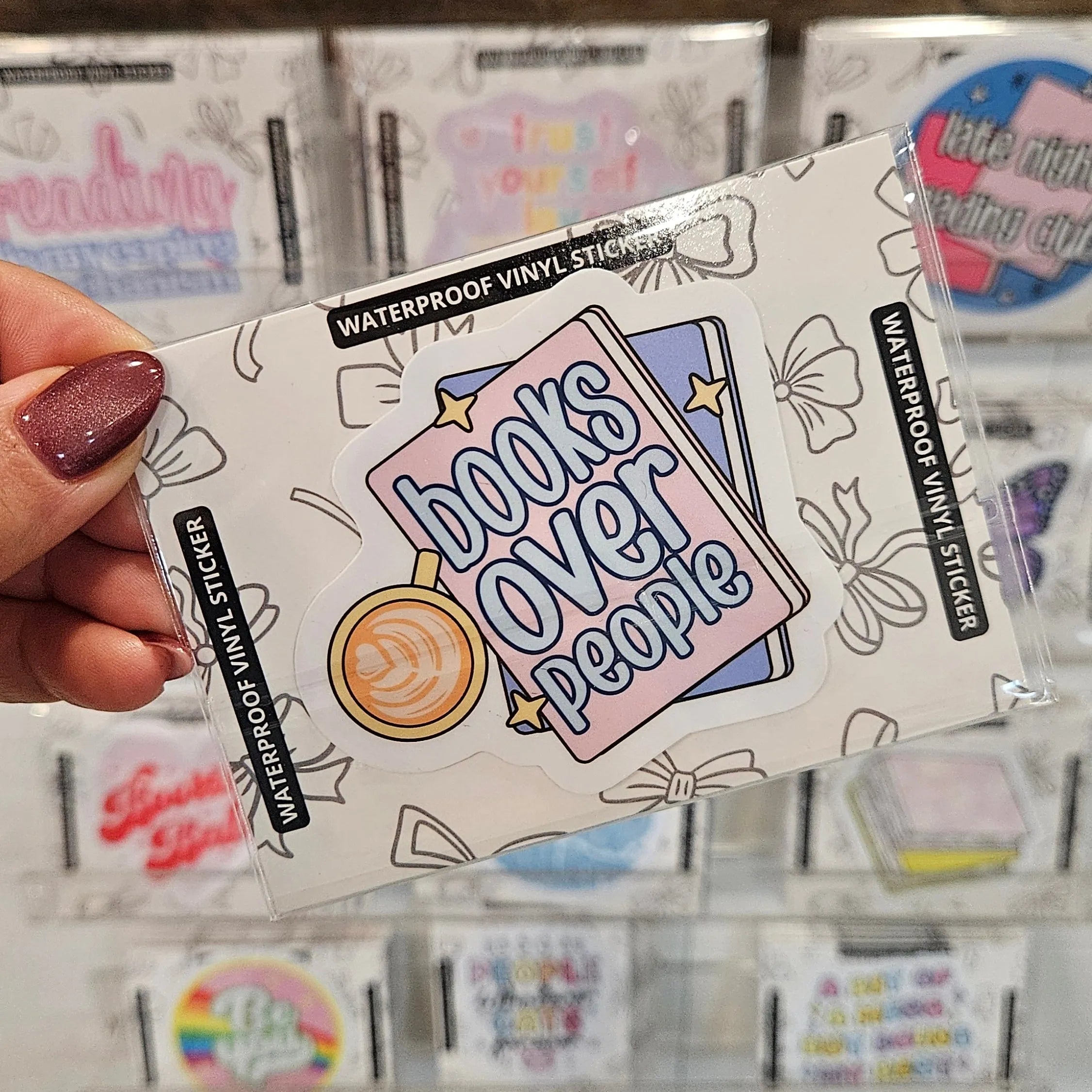 Shop Books Over People | Waterproof Vinyl Sticker- at Ruby Joy Boutique, a Women's Clothing Store in Pickerington, Ohio