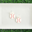 Shop Bow Baseball Earrings- at Ruby Joy Boutique, a Women's Clothing Store in Pickerington, Ohio