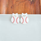 Shop Bow Baseball Earrings- at Ruby Joy Boutique, a Women's Clothing Store in Pickerington, Ohio