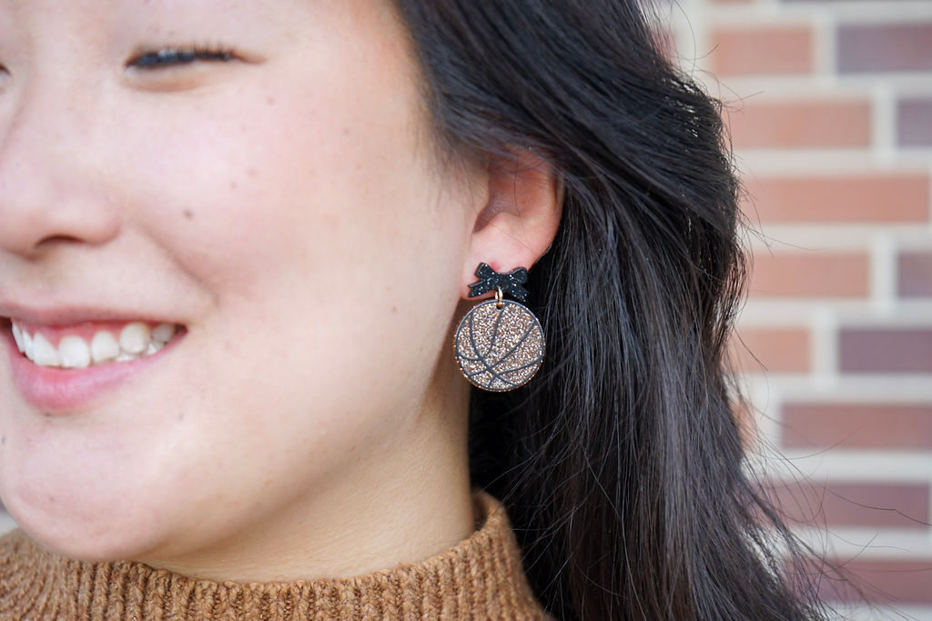 Shop Bow Basketball Earrings- at Ruby Joy Boutique, a Women's Clothing Store in Pickerington, Ohio