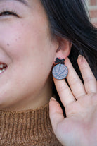 Shop Bow Basketball Earrings- at Ruby Joy Boutique, a Women's Clothing Store in Pickerington, Ohio