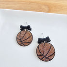 Shop Bow Basketball Earrings- at Ruby Joy Boutique, a Women's Clothing Store in Pickerington, Ohio