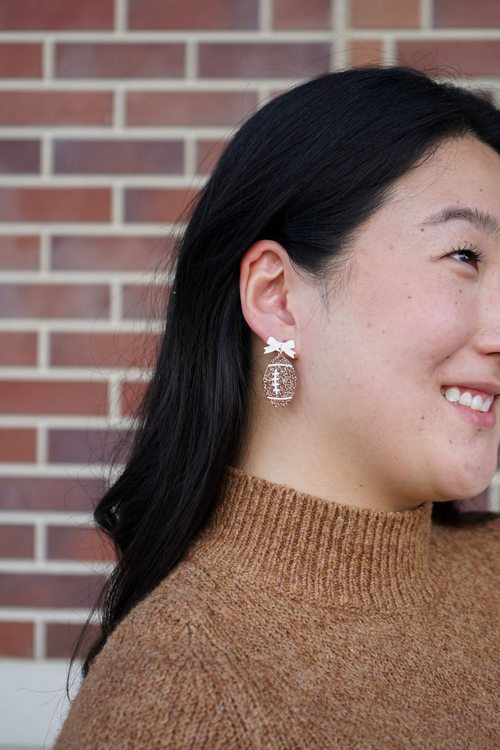 Shop Bow Football Earrings- at Ruby Joy Boutique, a Women's Clothing Store in Pickerington, Ohio