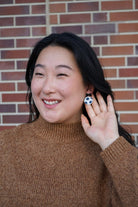 Shop Bow Soccer Ball Earrings- at Ruby Joy Boutique, a Women's Clothing Store in Pickerington, Ohio