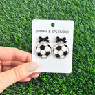 Shop Bow Soccer Ball Earrings- at Ruby Joy Boutique, a Women's Clothing Store in Pickerington, Ohio
