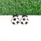 Shop Bow Soccer Ball Earrings- at Ruby Joy Boutique, a Women's Clothing Store in Pickerington, Ohio