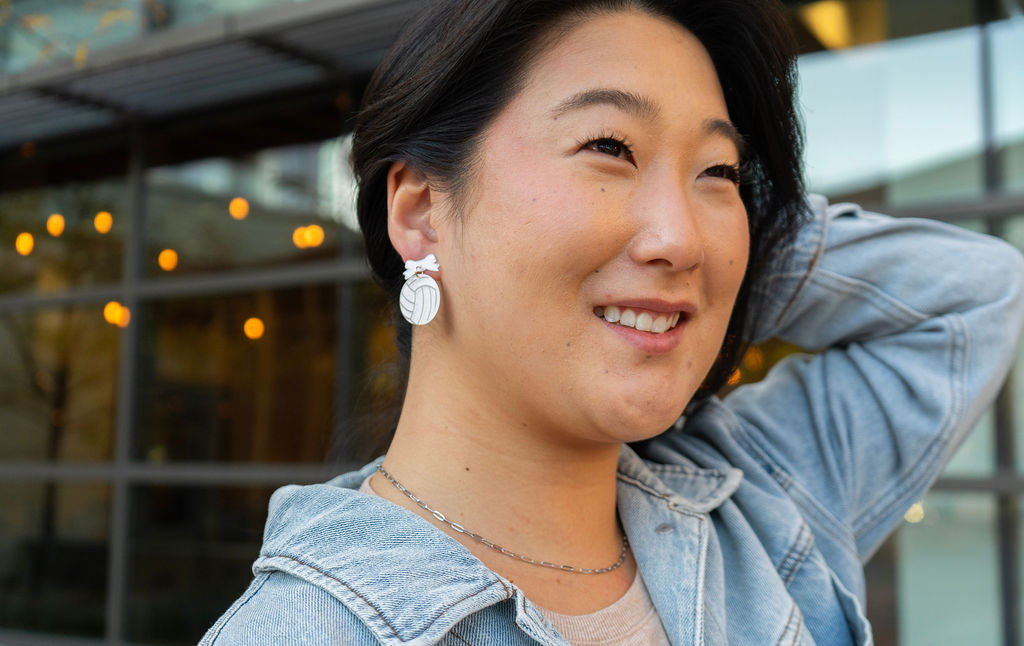 Shop Bow Volleyball Earrings- at Ruby Joy Boutique, a Women's Clothing Store in Pickerington, Ohio