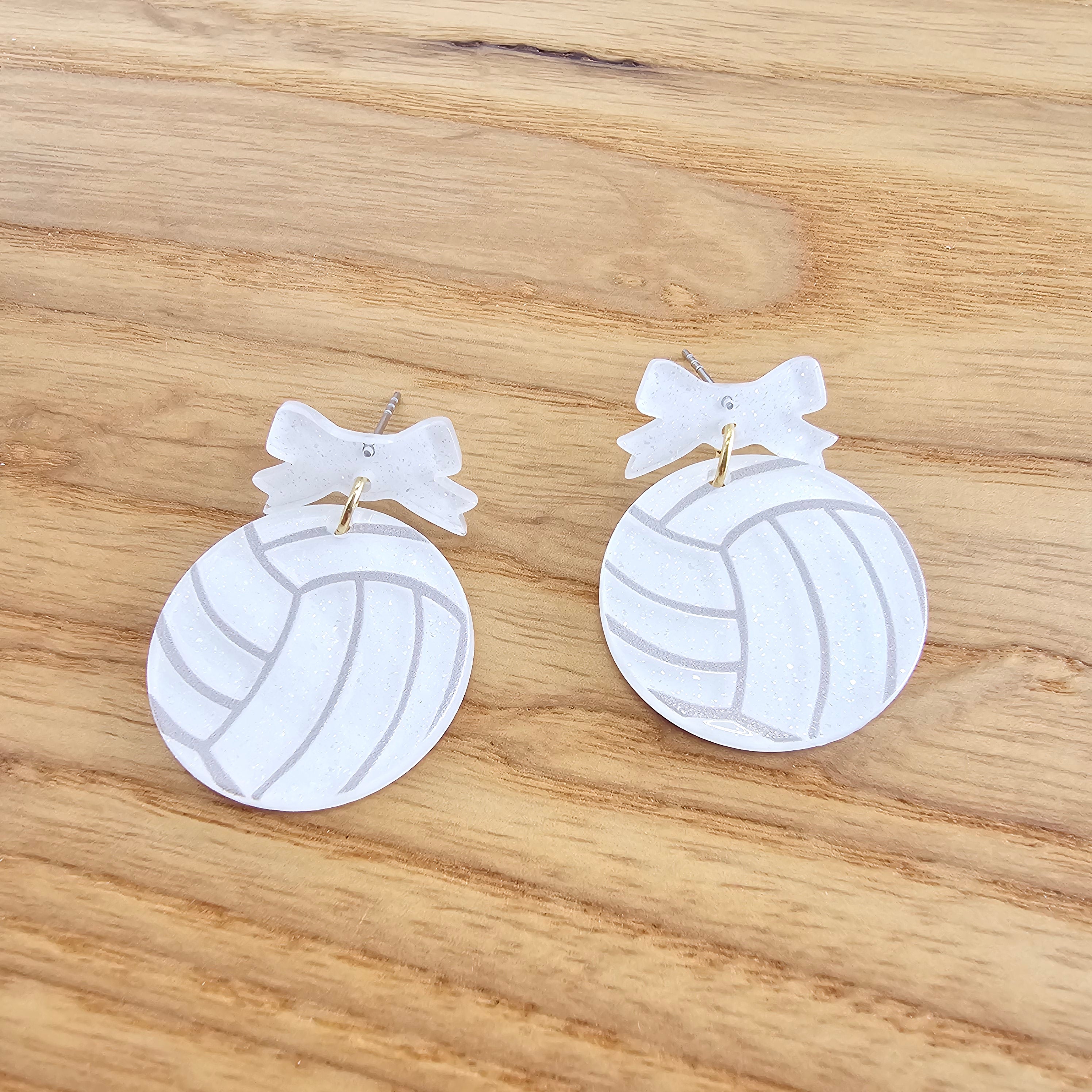 Shop Bow Volleyball Earrings- at Ruby Joy Boutique, a Women's Clothing Store in Pickerington, Ohio