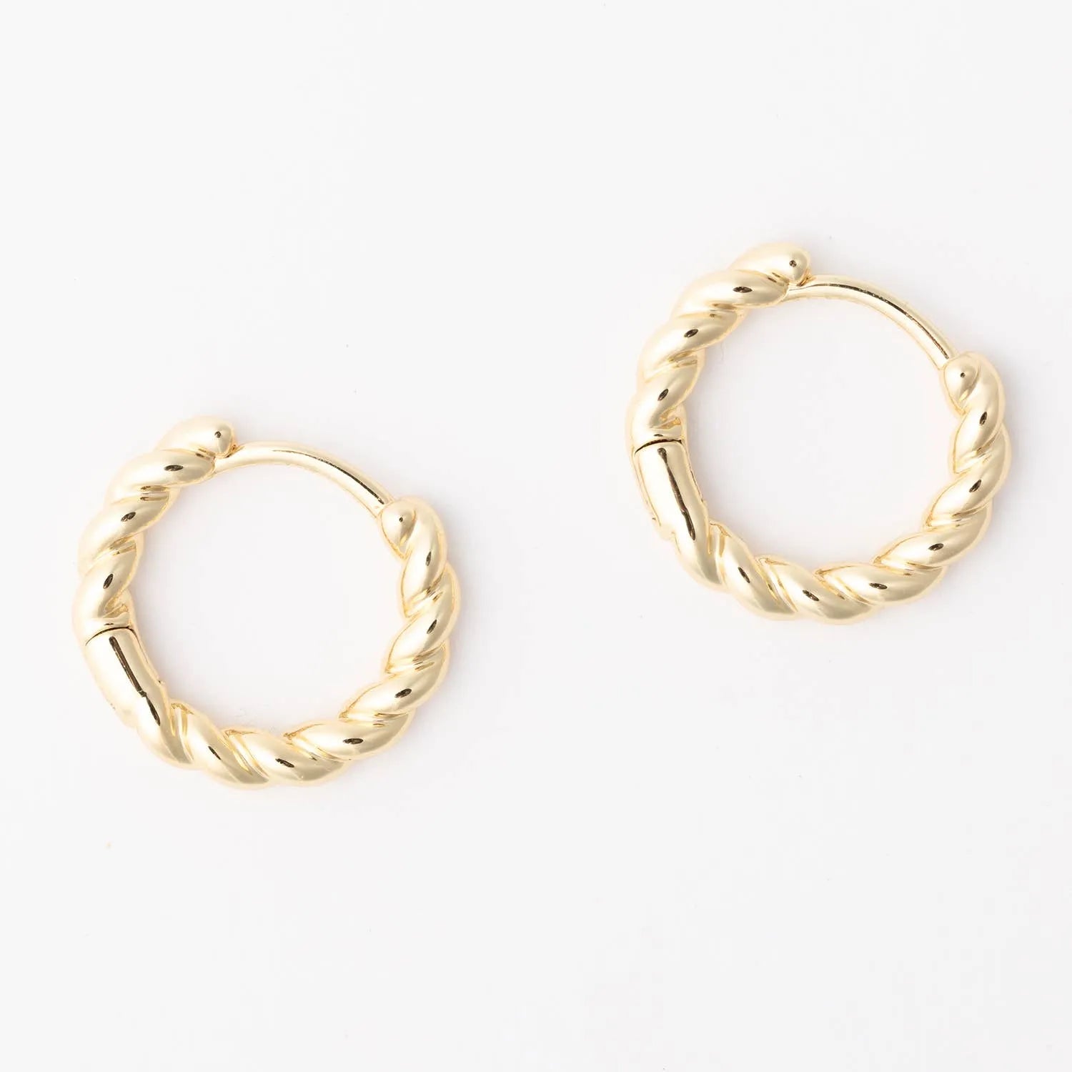 Shop Brandi Twisted Huggie Earrings- at Ruby Joy Boutique, a Women's Clothing Store in Pickerington, Ohio