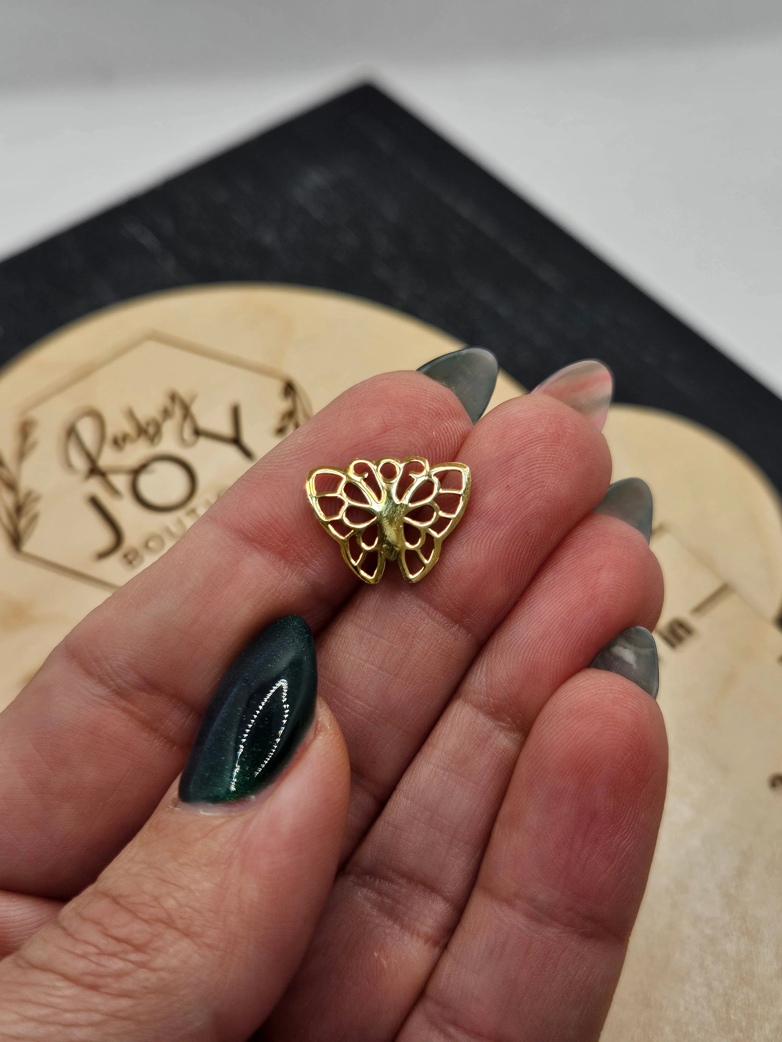 Shop Butterfly Charm- at Ruby Joy Boutique, a Women's Clothing Store in Pickerington, Ohio