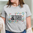 Shop Christmas Lights and Equal Rights Graphic Top- at Ruby Joy Boutique, a Women's Clothing Store in Pickerington, Ohio