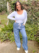 Shop Cora Chambray Wide Leg Pant-Denim at Ruby Joy Boutique, a Women's Clothing Store in Pickerington, Ohio