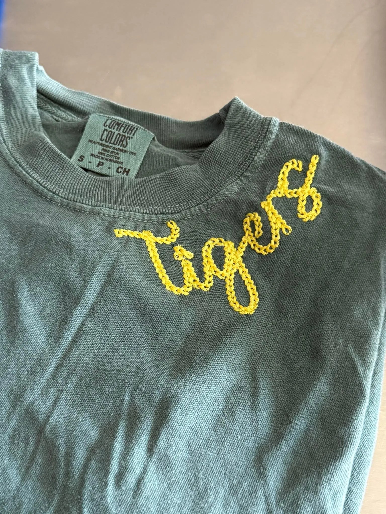 Shop Custom Retro Chainstitch Embroidered Top-T-Shirt at Ruby Joy Boutique, a Women's Clothing Store in Pickerington, Ohio