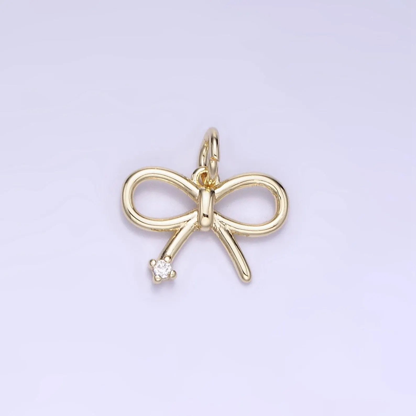 Shop Dainty Bow Charm- at Ruby Joy Boutique, a Women's Clothing Store in Pickerington, Ohio