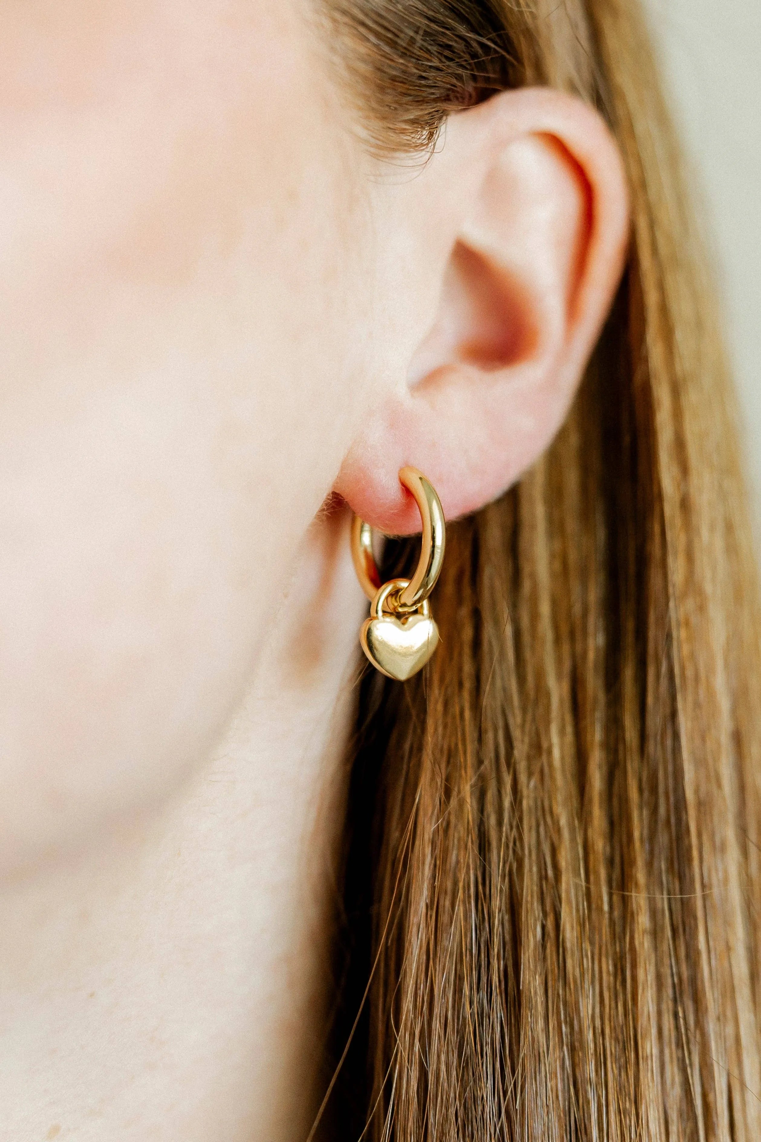 Shop Dakota Heart Huggie Charm Earrings- at Ruby Joy Boutique, a Women's Clothing Store in Pickerington, Ohio