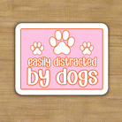 Shop Distracted by Dogs Waterproof Vinyl Sticker- at Ruby Joy Boutique, a Women's Clothing Store in Pickerington, Ohio