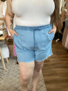 Shop Distressed Hem Patch Pocket Shorts- at Ruby Joy Boutique, a Women's Clothing Store in Pickerington, Ohio