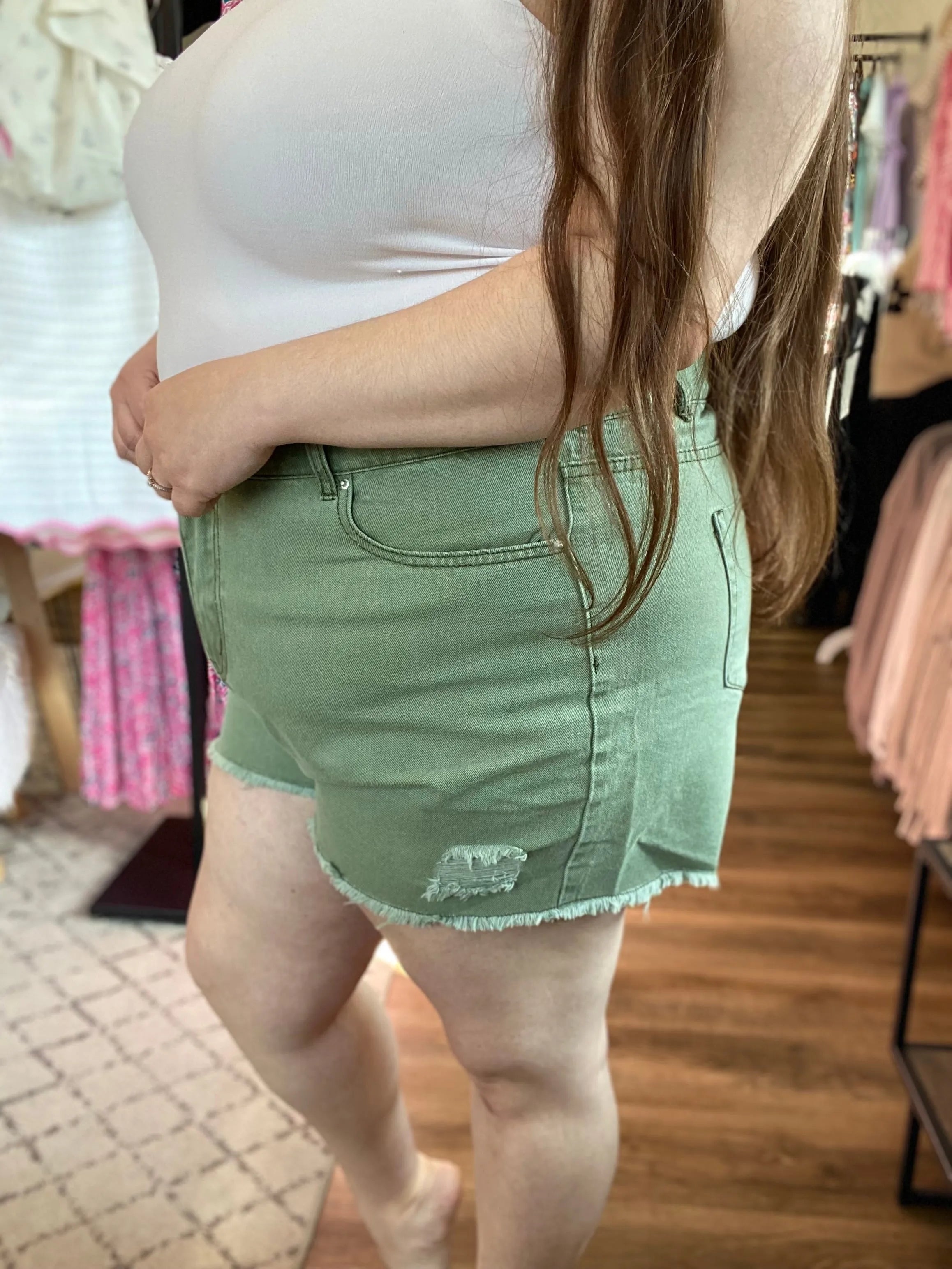 Shop Distressed Washed Color Denim Shorts - Olive-1XL at Ruby Joy Boutique, a Women's Clothing Store in Pickerington, Ohio