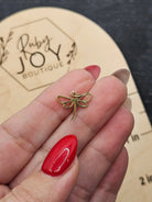 Shop Dragonfly Outline Charm- at Ruby Joy Boutique, a Women's Clothing Store in Pickerington, Ohio