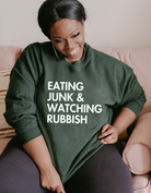 Shop Eating Junk & Watching Rubbish Graphic Top | Home Alone Christmas- at Ruby Joy Boutique, a Women's Clothing Store in Pickerington, Ohio
