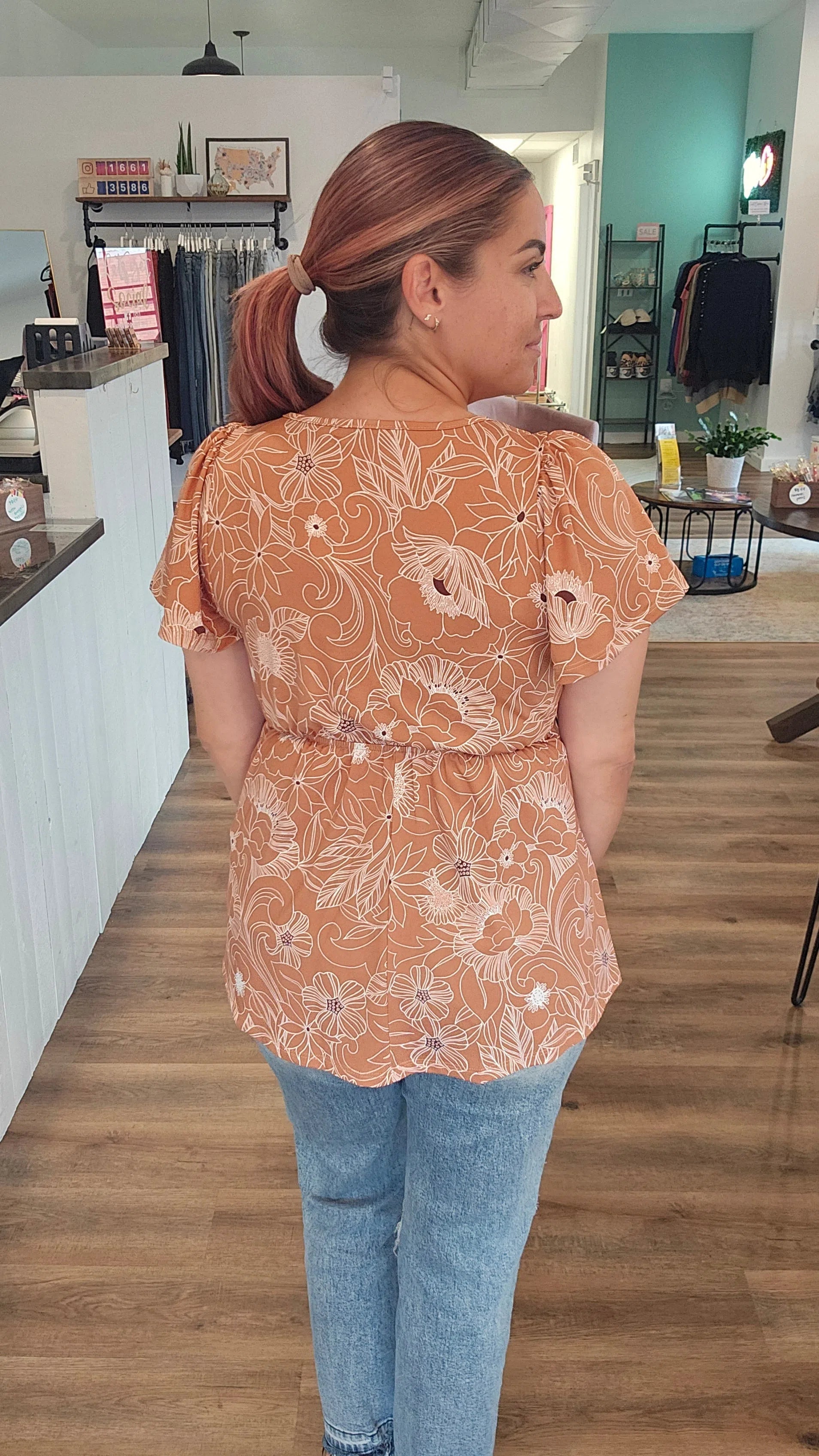 Shop Emery Ruffle Top - Cocoa Floral-Shirts at Ruby Joy Boutique, a Women's Clothing Store in Pickerington, Ohio