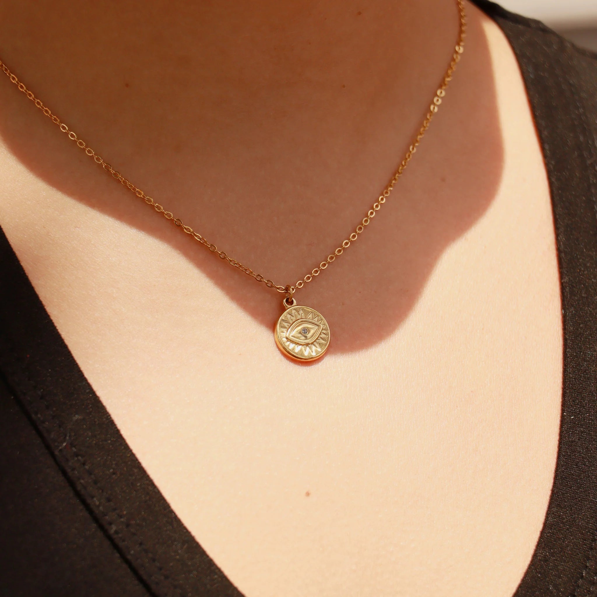 Shop Evil Eye Sun Disc Charm- at Ruby Joy Boutique, a Women's Clothing Store in Pickerington, Ohio