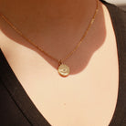 Shop Evil Eye Sun Disc Charm- at Ruby Joy Boutique, a Women's Clothing Store in Pickerington, Ohio