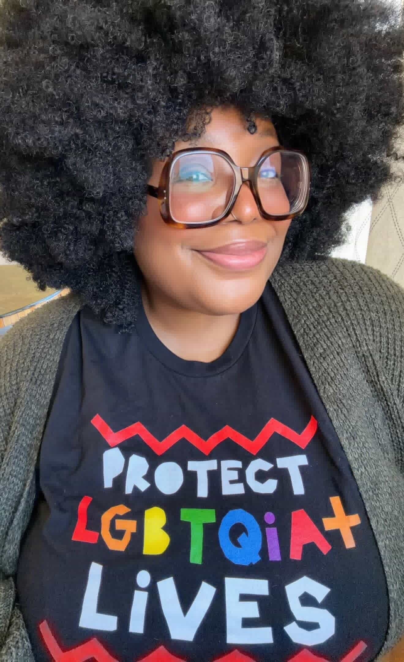 Shop Protect LGBTQIA+ Lives Classic Tee- at Ruby Joy Boutique, a Women's Clothing Store in Pickerington, Ohio