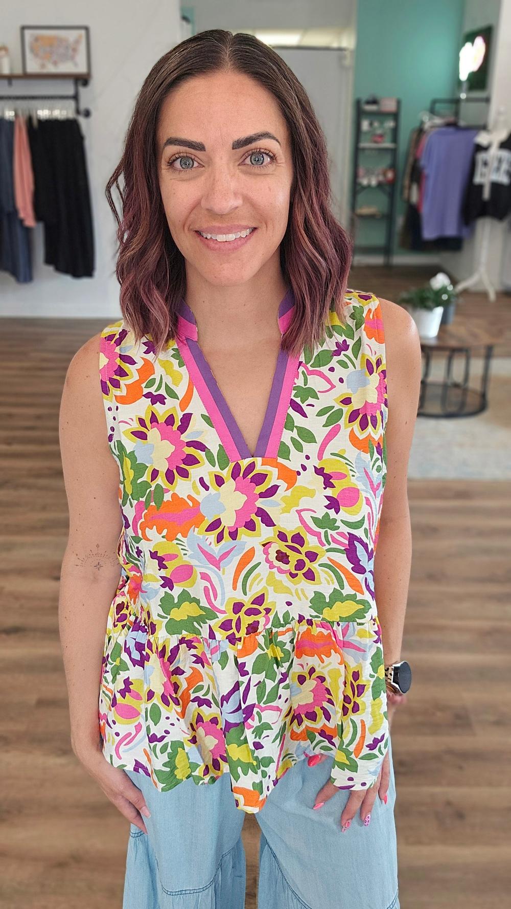 Shop Floral Print Contrast Trim Sleeveless Peplum Blouse- at Ruby Joy Boutique, a Women's Clothing Store in Pickerington, Ohio