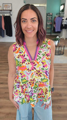 Shop Floral Print Contrast Trim Sleeveless Peplum Blouse- at Ruby Joy Boutique, a Women's Clothing Store in Pickerington, Ohio