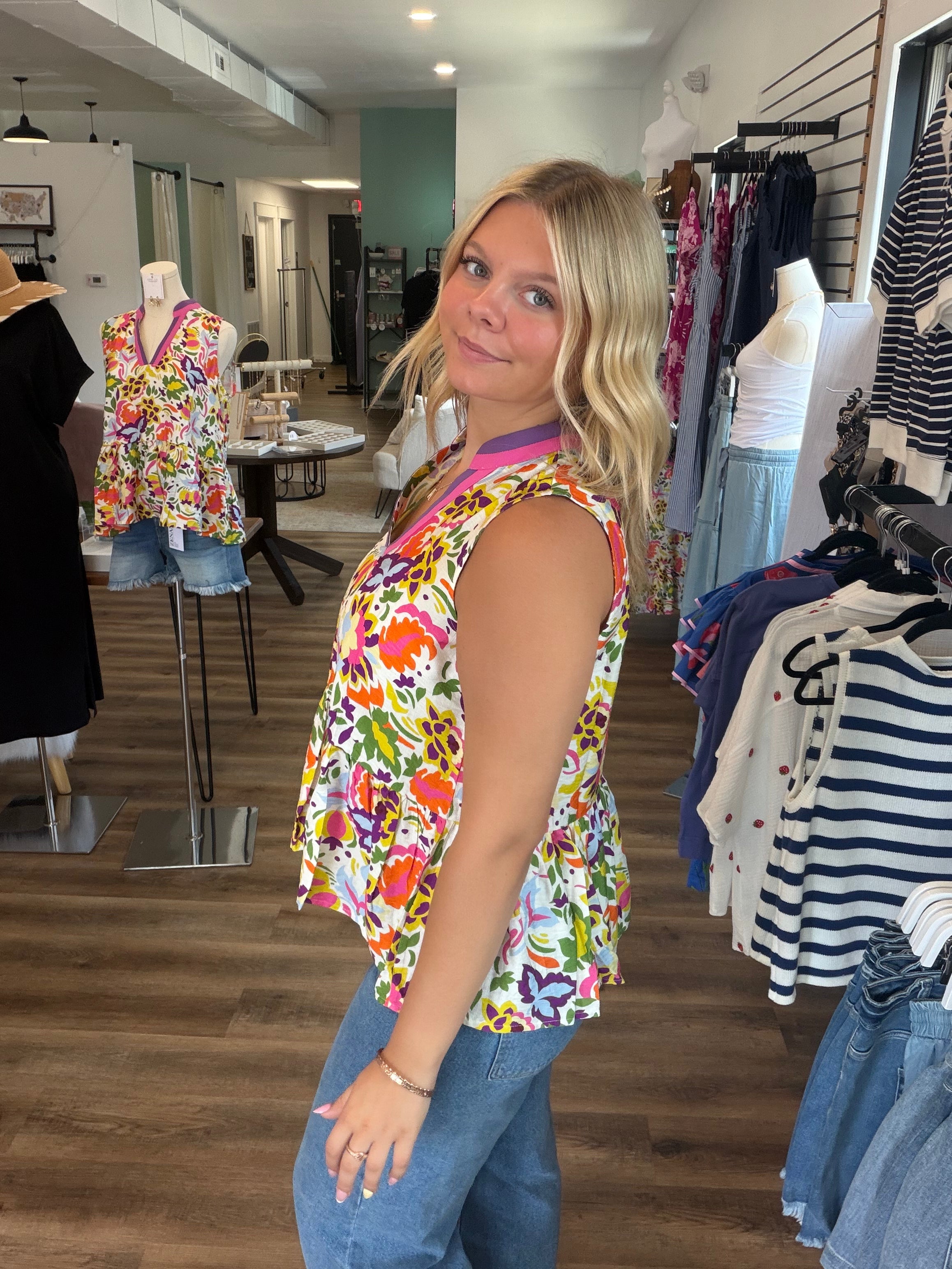 Shop Floral Print Contrast Trim Sleeveless Peplum Blouse- at Ruby Joy Boutique, a Women's Clothing Store in Pickerington, Ohio